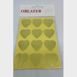 Oblater hjerter i guld og slv